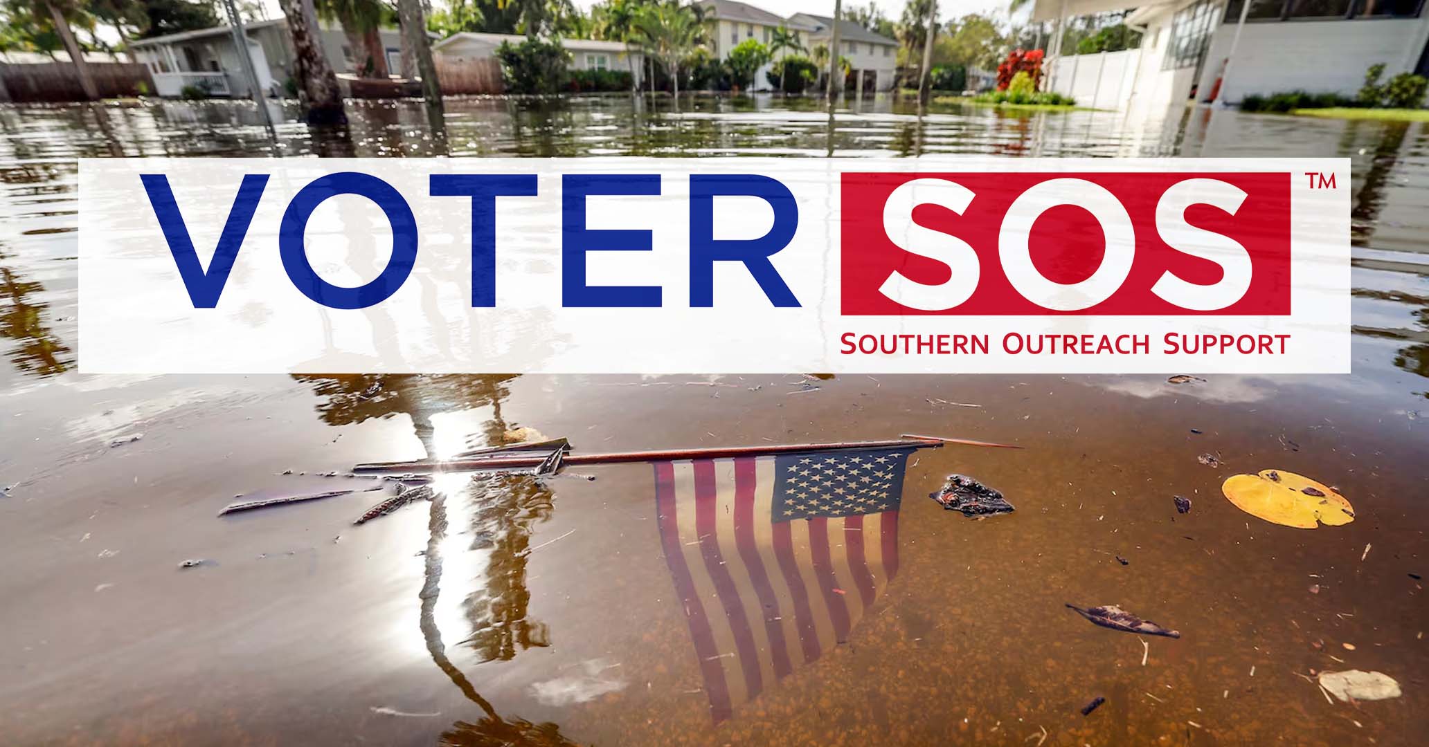 An American flag floats in a flooded Florida community after Hurricane Helene.